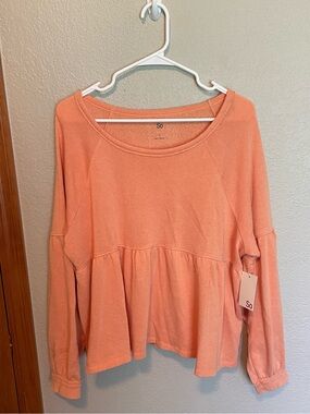 Orange peplum top